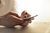 person using a digital wallet on a mobile device