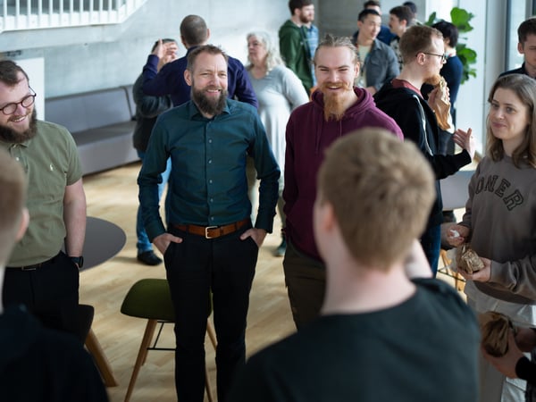 Group of people discussing decentralized trust and web3