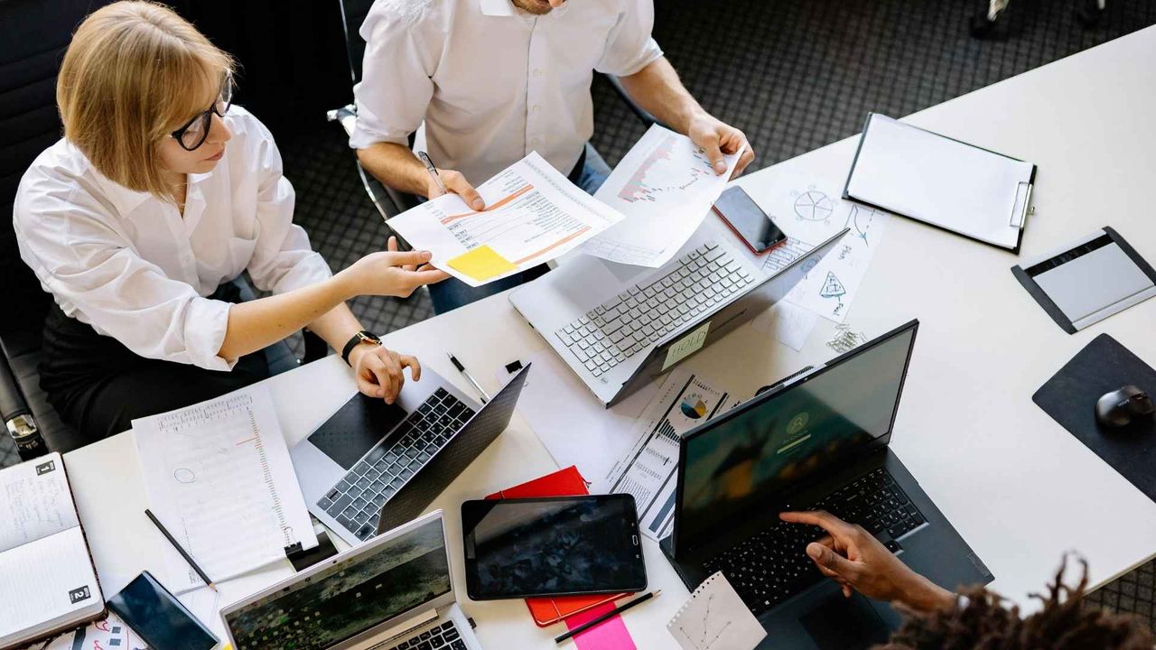 people collaborating on data using multi party computation and blockchain